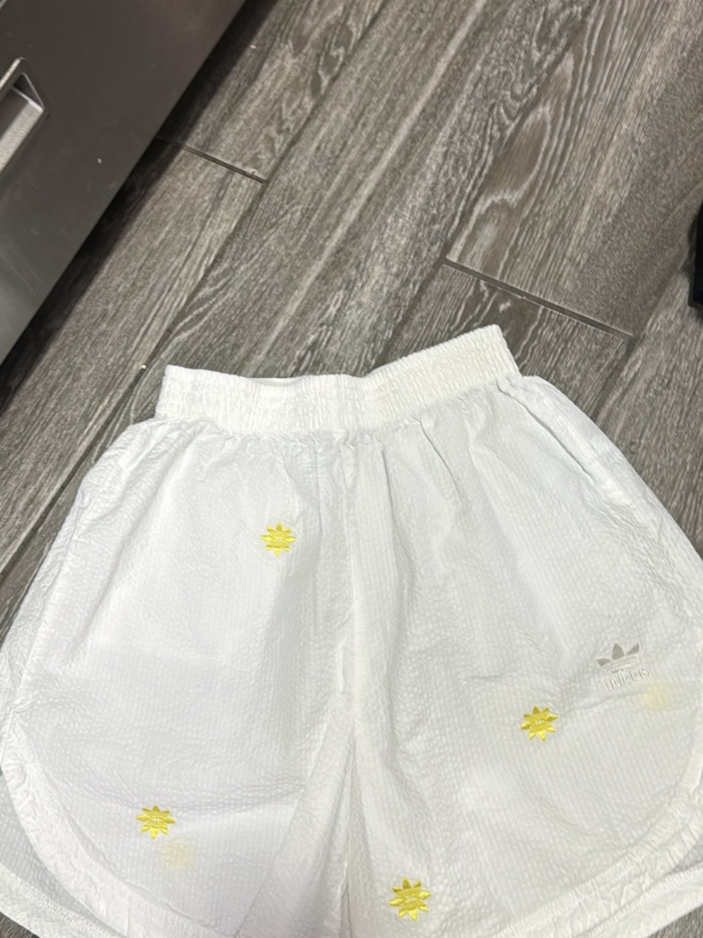 adidas White Athletic baggy Shorts with Yellow Sun Embroidery